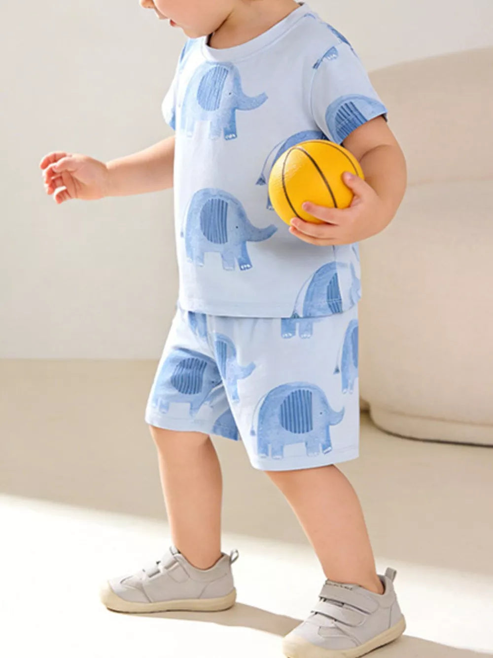 Light blue cotton toddler boys' shorts and t-shirt set with playful elephant print.