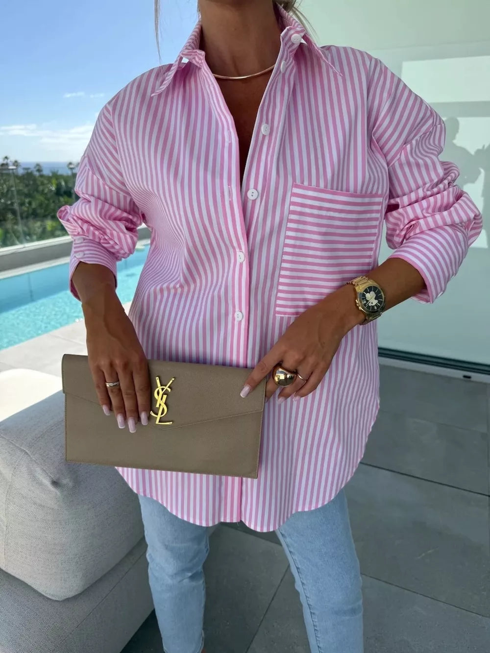 light pink button-up shirt with striped and collared