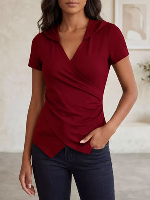 Red ruched hooded slim fit t-shirt with asymmetrical wrap front and short sleeves.