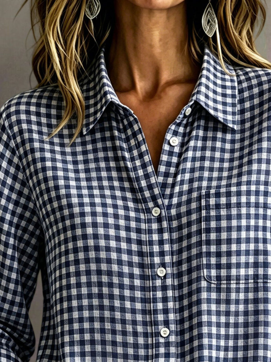 light blue button-down shirt featuring buttoned and gingham