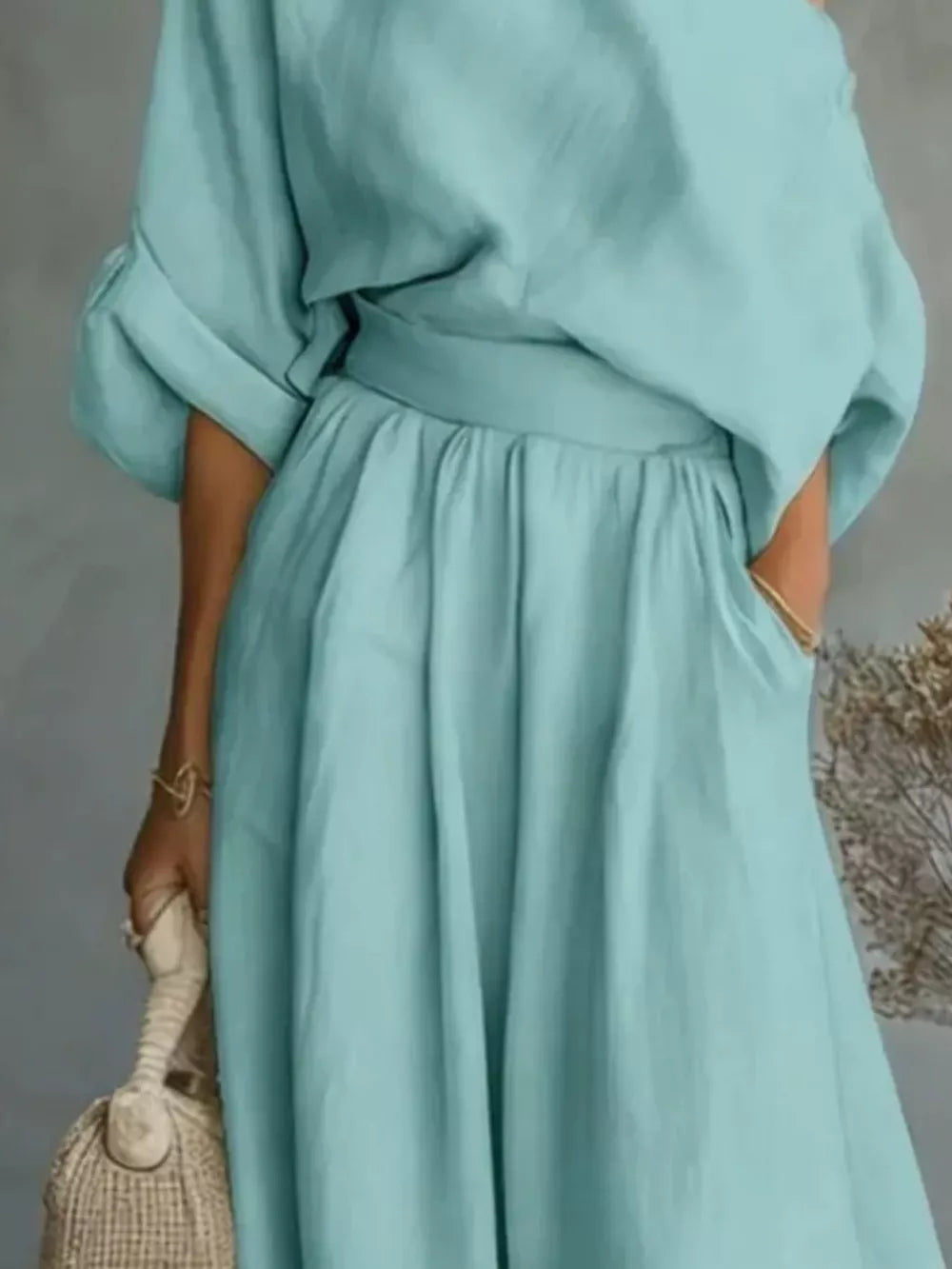 two-piece set in Yellow-Green with one-shoulder and elbow sleeve