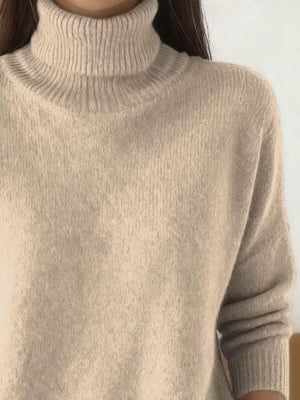 100% polyester Care instructions: Machine wash cold turtleneck sweater in Apricot with relaxed silhouette