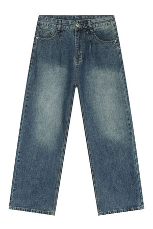 Pleated baggy denim jeans in medium wash cotton with a relaxed fit.
