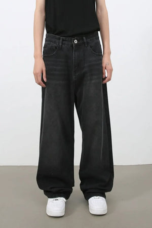 Black wide leg denim jeans with a casual, relaxed fit.