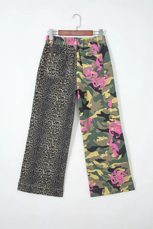 Contrast patchwork jeans with leopard print and pink floral camo design.