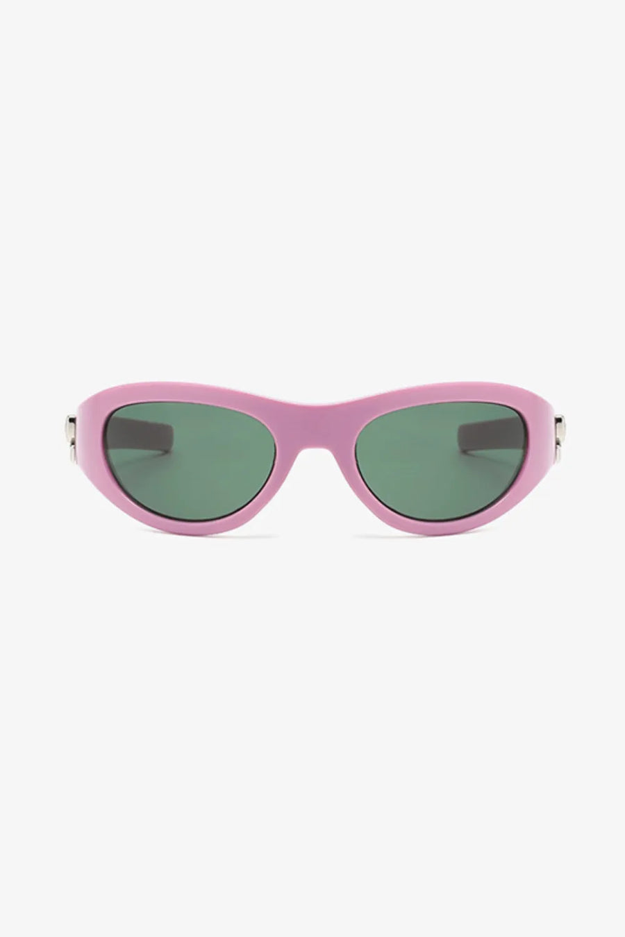 Dusty pink sporty shield sunglasses with green lenses and a bow accent.