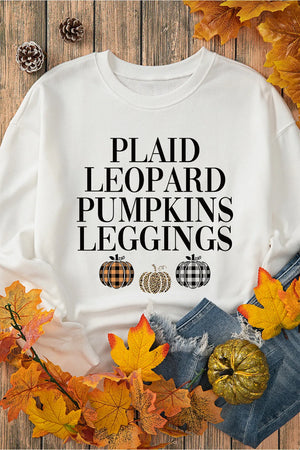 White round neck sweatshirt with text and three pumpkins: plaid, leopard, and buffalo check patterns.