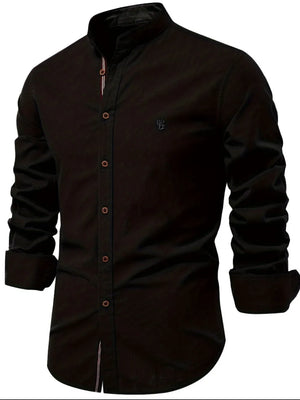 Black linen shirt with mandarin collar, button front, and embroidered detail.