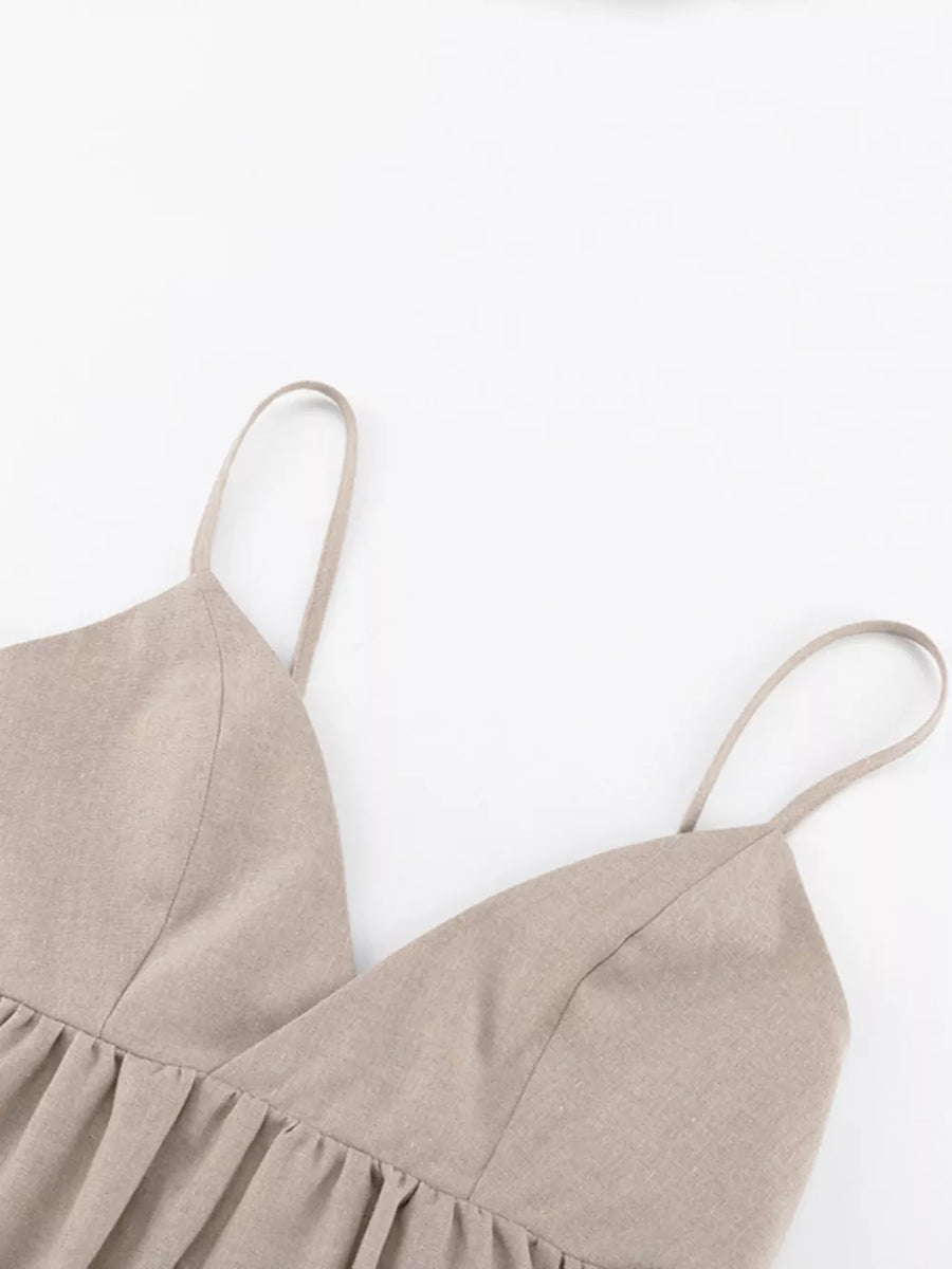 Tan linen blend cami dress with spaghetti straps and gathered waist