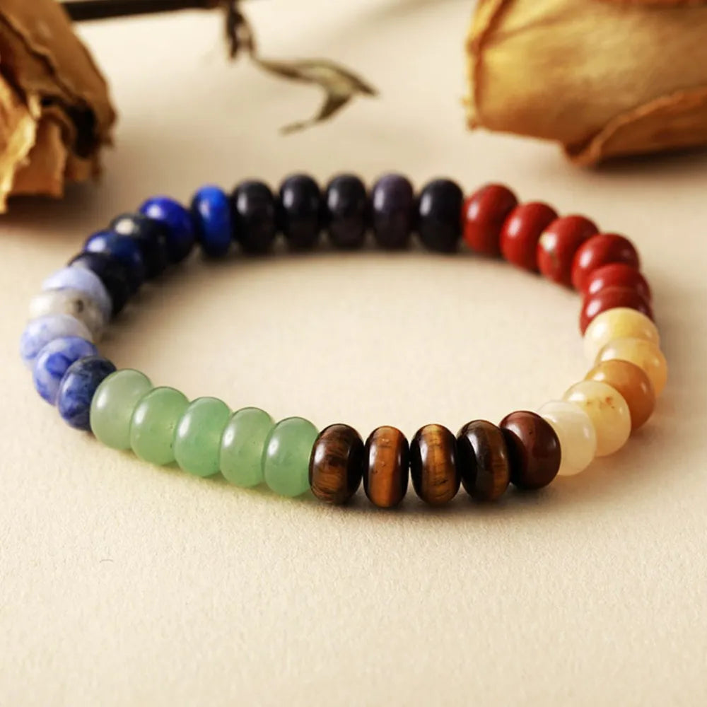 Chakra stone bead bracelet with colorful natural stones and tiger eye beads.