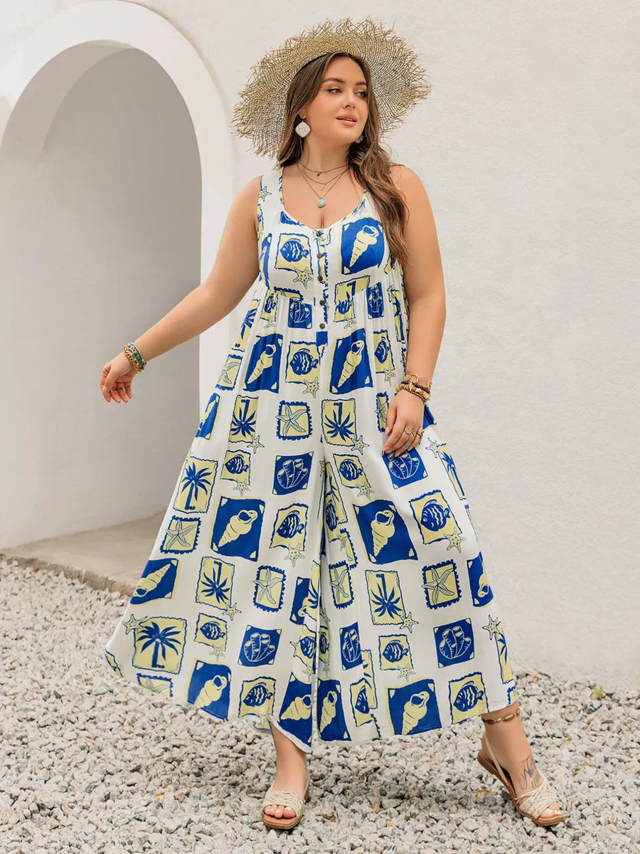 Plus-size relaxed jumpsuit with nautical print, button front, sleeveless, and wide legs.