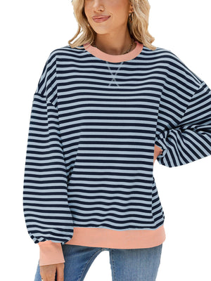 Striped crew neck sweatshirt in navy and light blue with coral trim and cuffs.