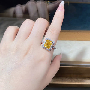 ring in yellow with geometric and zircon gemstone