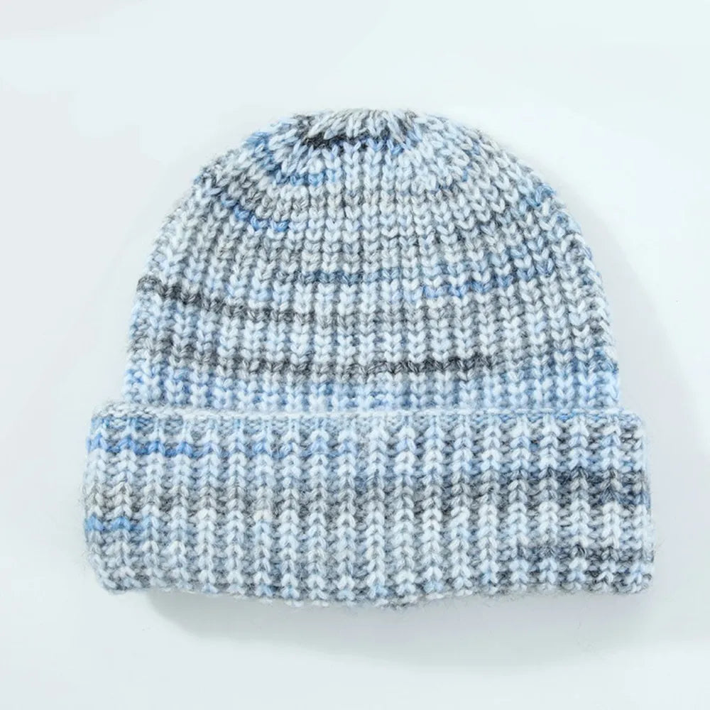 Textured mélange ribbed beanie in pastel blue with a cuffed brim.