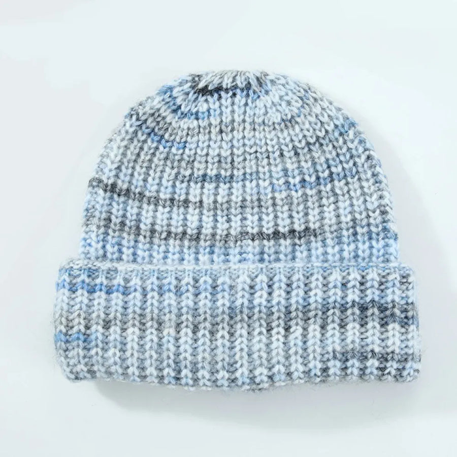 Textured mélange ribbed beanie in pastel blue with a cuffed brim.