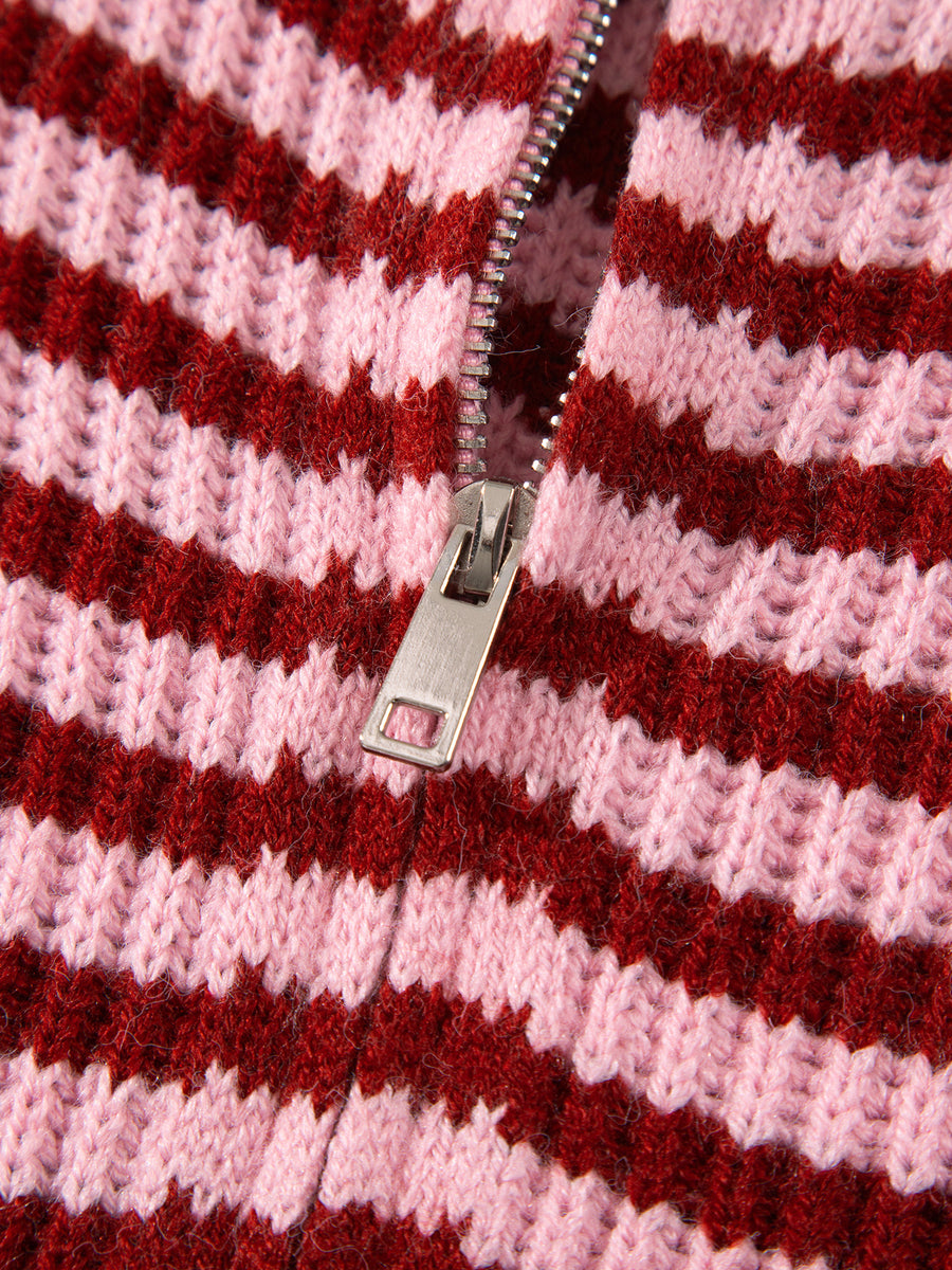 light pink zip-up sweater with drop shoulder and long sleeve