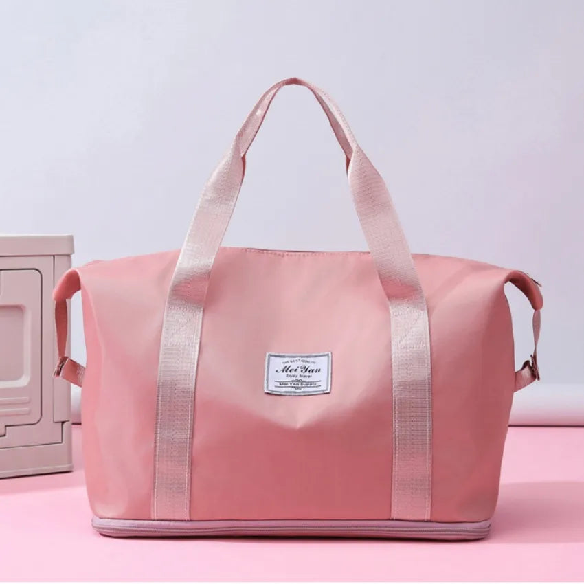 Weekend Escape Nylon Tote in Dusty Pink with dual handles and a central label.