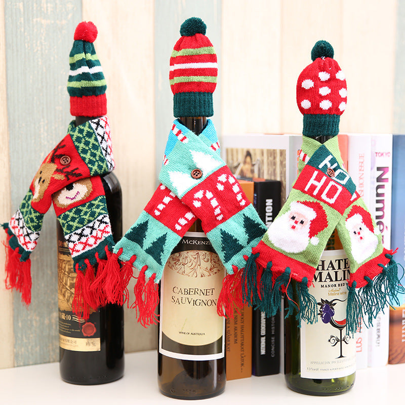 Holiday knit bottle cosies with Santa, reindeer, and candy cane designs.