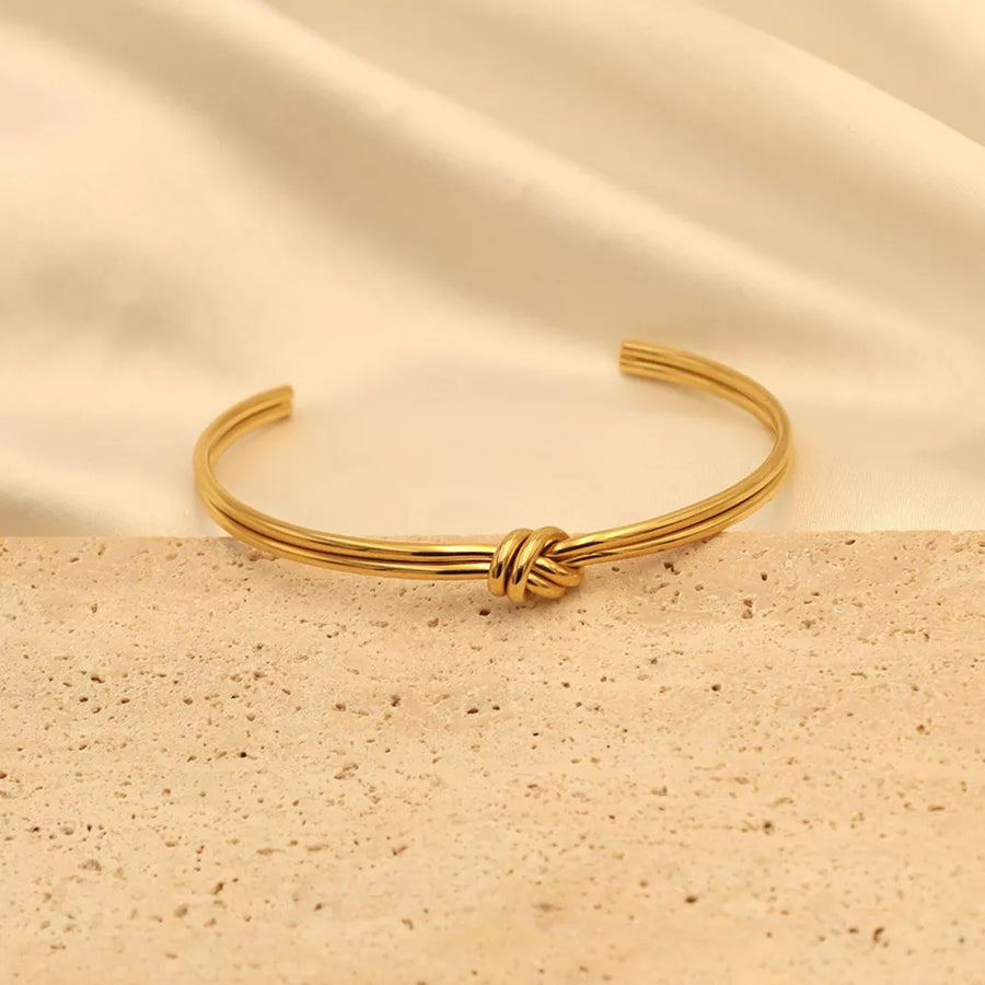 18K Gold-Plated,Stainless Steel Care instructions: Avoid wearing during exercise bracelet in Gold with open cuff silhouette