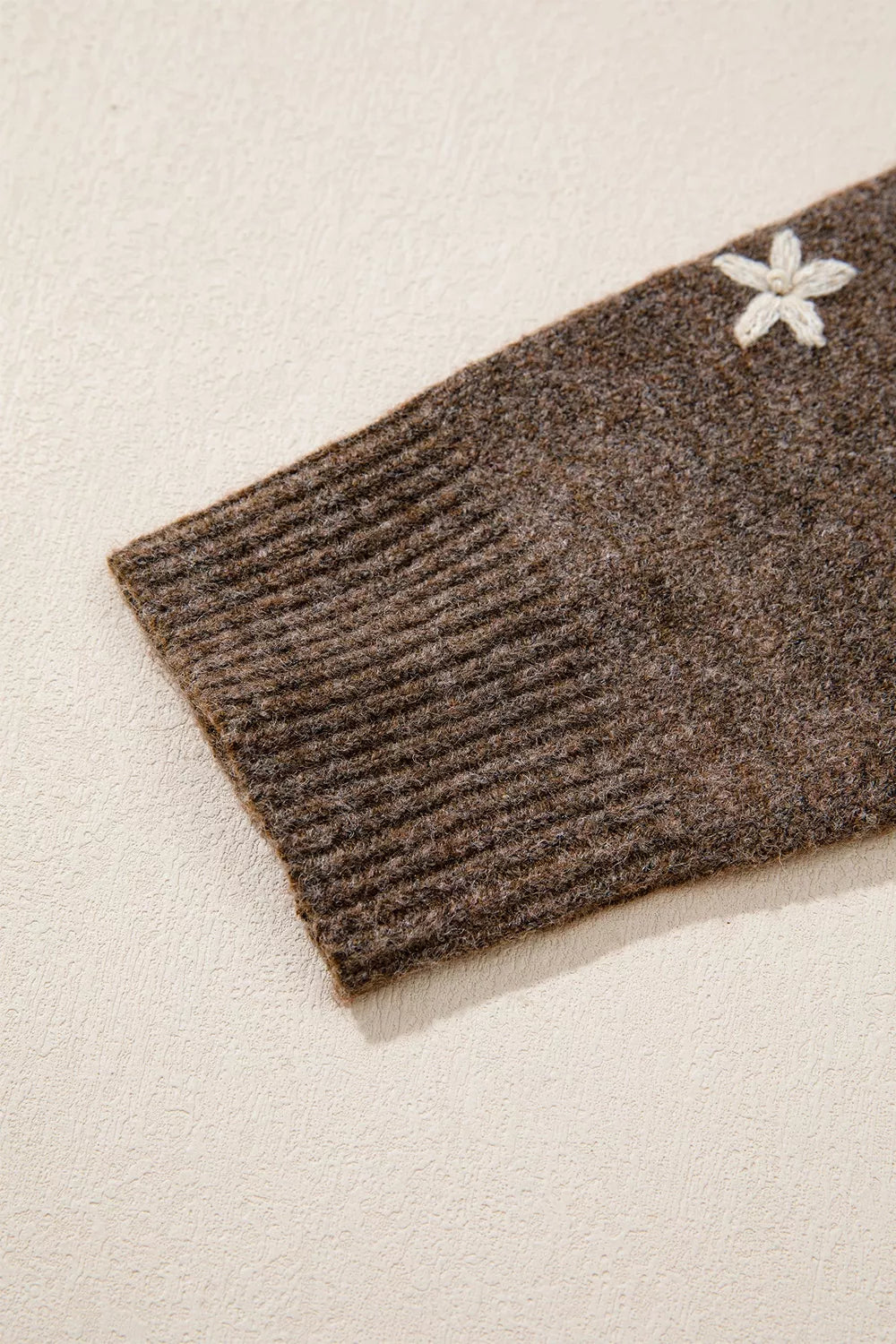 chocolate brown mock neck sweater with ribbed cuffs and long sleeve