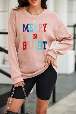 Dusty Pink ribbed sweatshirt with "Merry and Bright" text graphic.