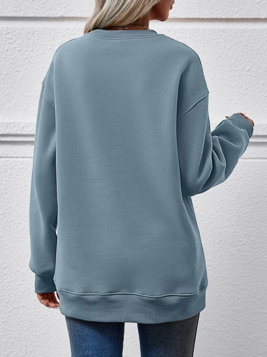 French Blue graphic sweatshirt with crew neck and long sleeves.