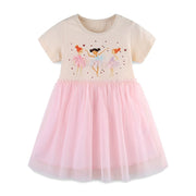 Baby girls' cream cotton dress with ballerina graphic and pink tulle skirt.