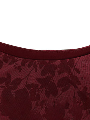 Burgundy floral mesh bodycon mini dress with a crew neck detail.