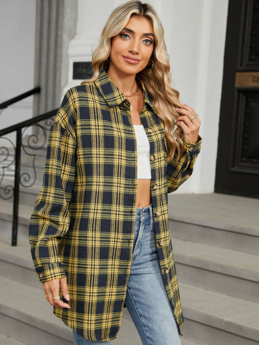 Oversized yellow and black plaid shacket with button front and collar.