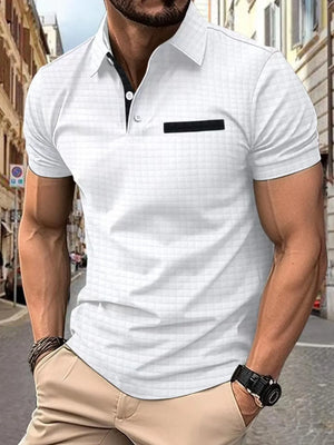 White textured polo shirt with black contrast pocket detail and collar trim.