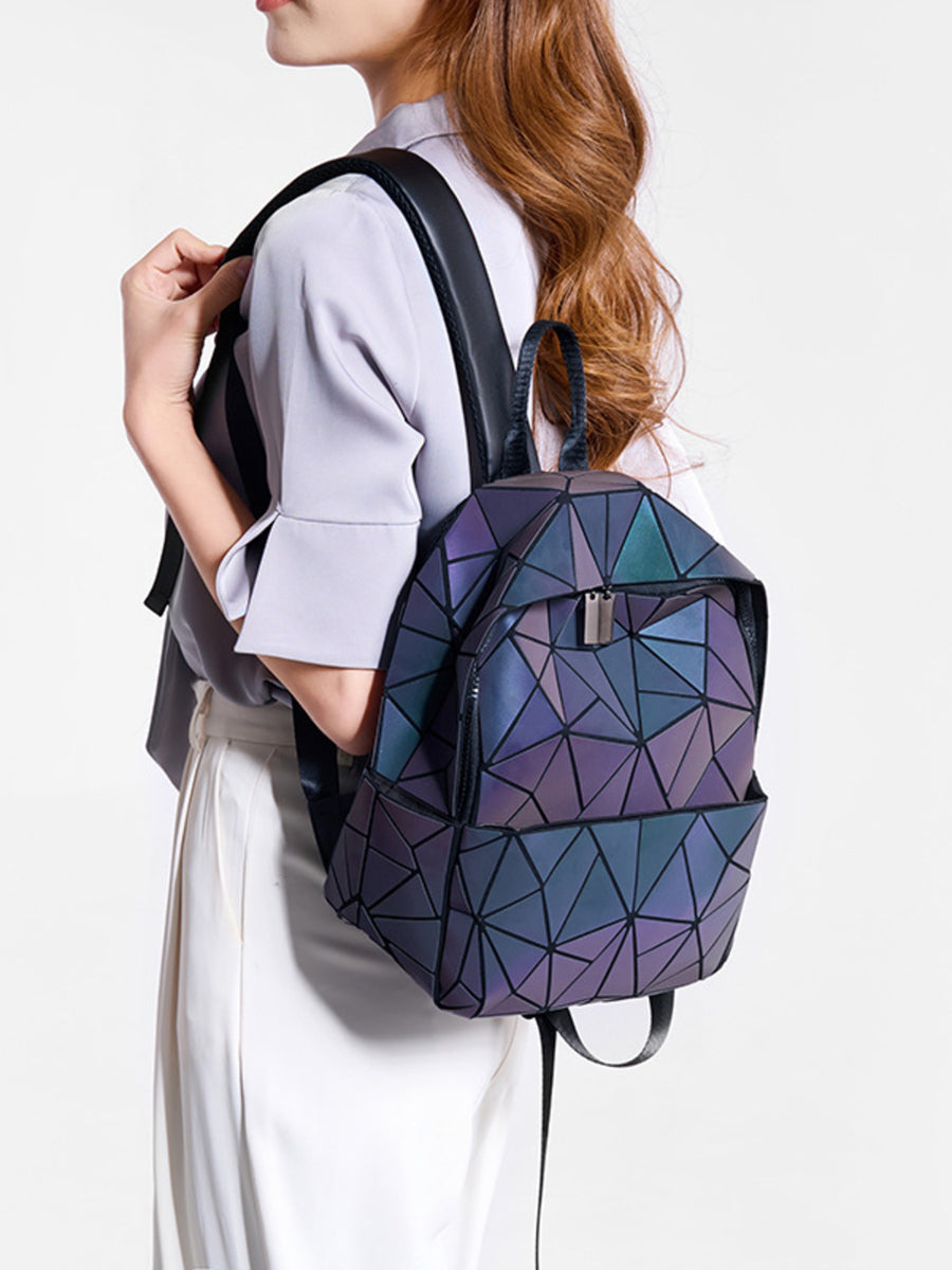 dark teal backpack featuring adjustable straps and geometric