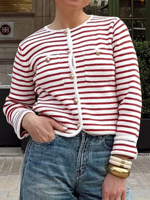 Buttoned red and white striped knit cardigan with gold buttons and white trim.