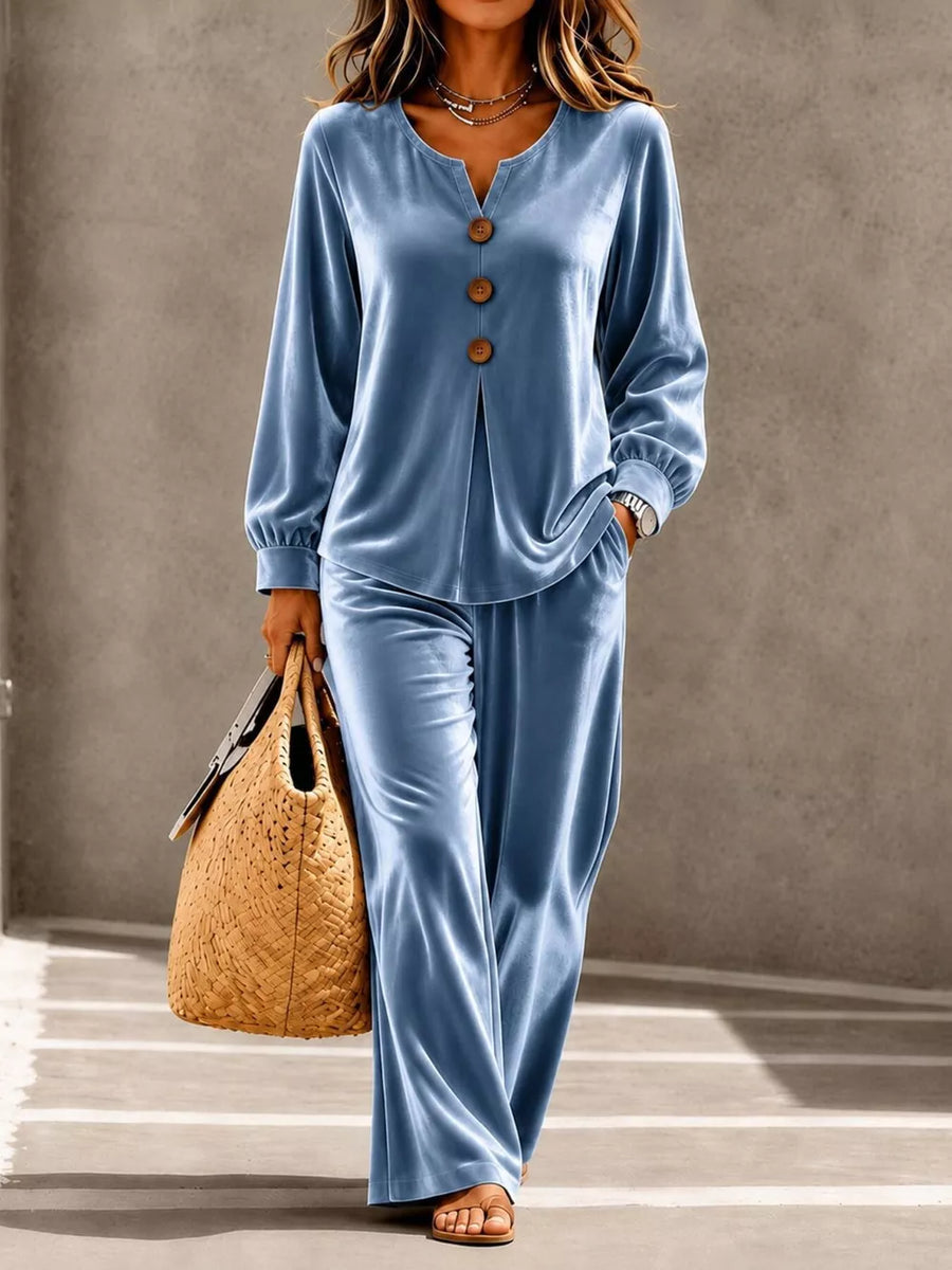 100% polyester Care instructions: Machine wash cold pajama set in Black with relaxed silhouette