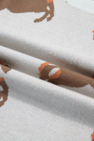Equestrian-inspired knit sweater in beige with brown horse pattern and puff sleeves.