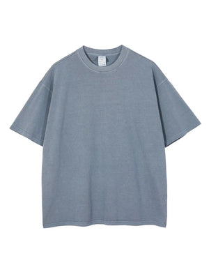 Oversized washed cotton tee in Dusty Blue with relaxed fit and crew neck.
