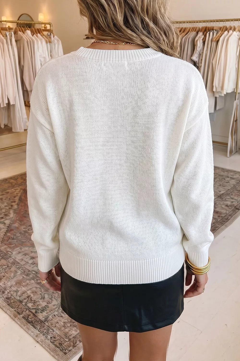 White pullover sweater with hip-length and pullover