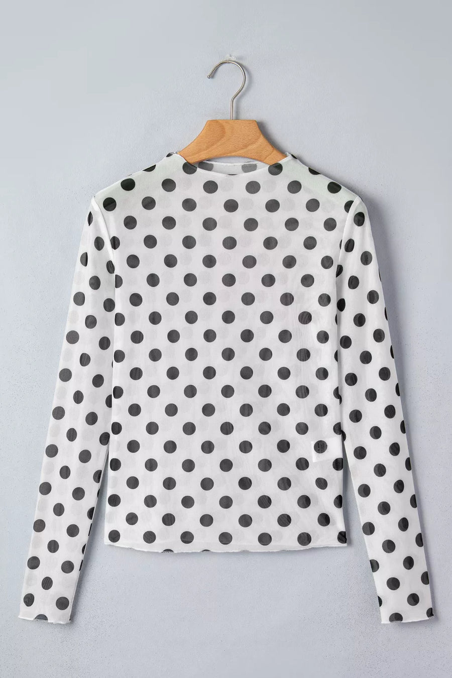 White sheer mesh polka dot mock neck long sleeve maternity shirt