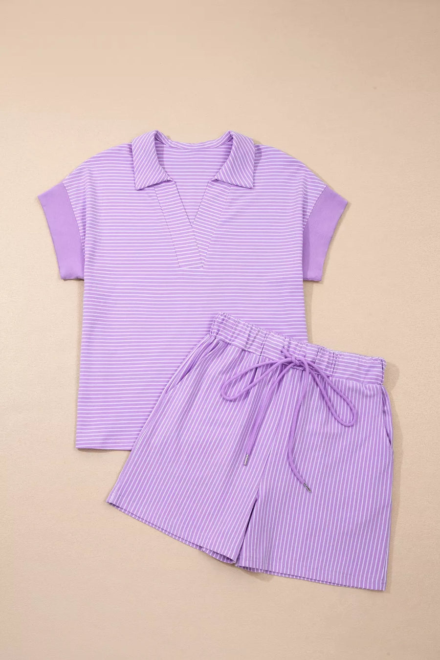 Purple striped polo shirt and drawstring shorts loungewear set.