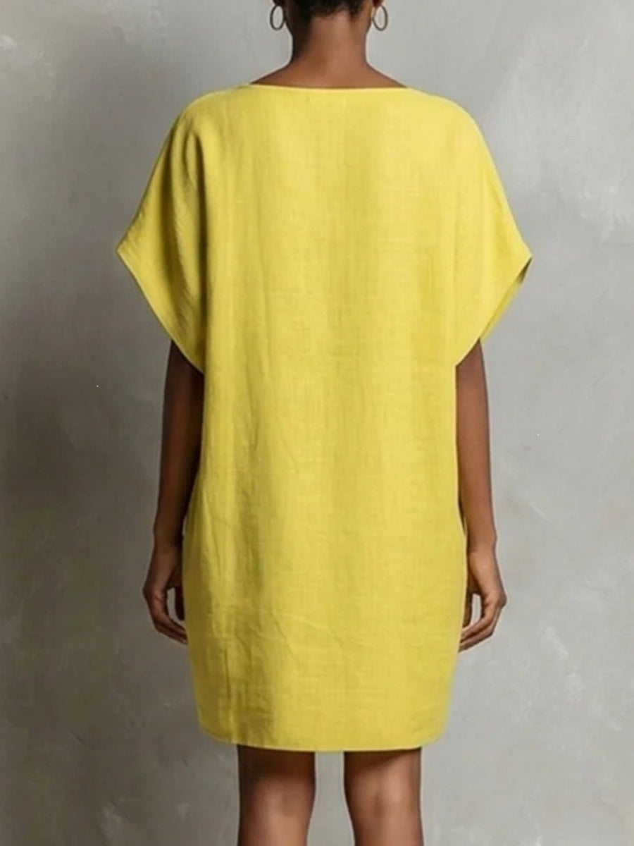 Yellow shift dress with mini and pullover