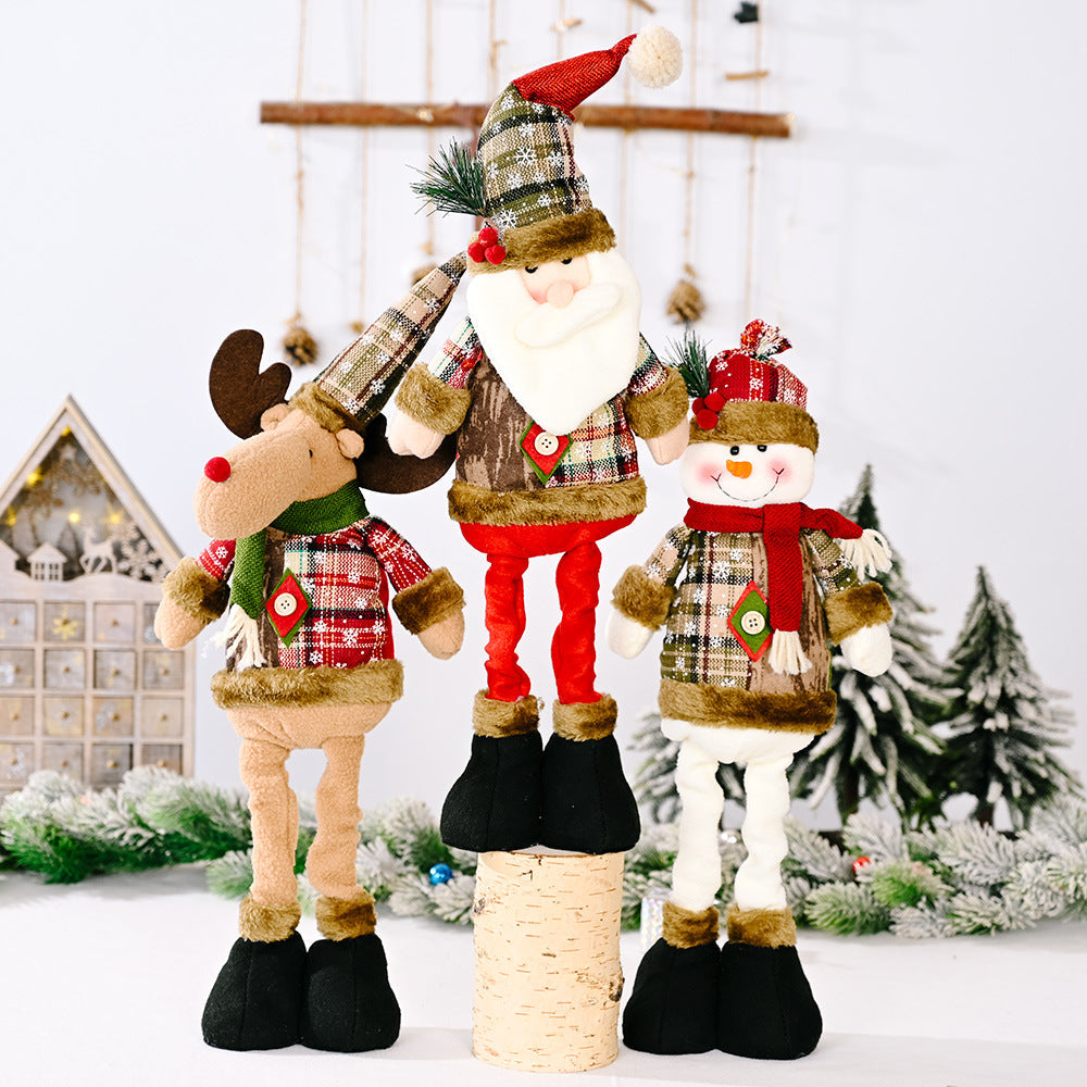 Festive Plaid Character Trio: Santa, Snowman, and Reindeer plush figures with plaid patterns and red scarves.