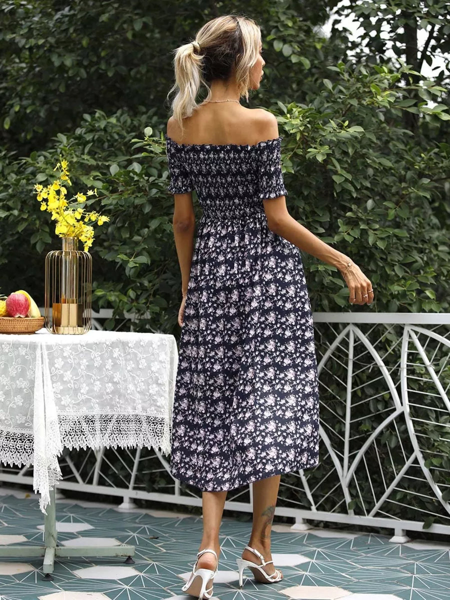Floral off-shoulder midi dress in Dark Navy with smocked bodice and short sleeves.