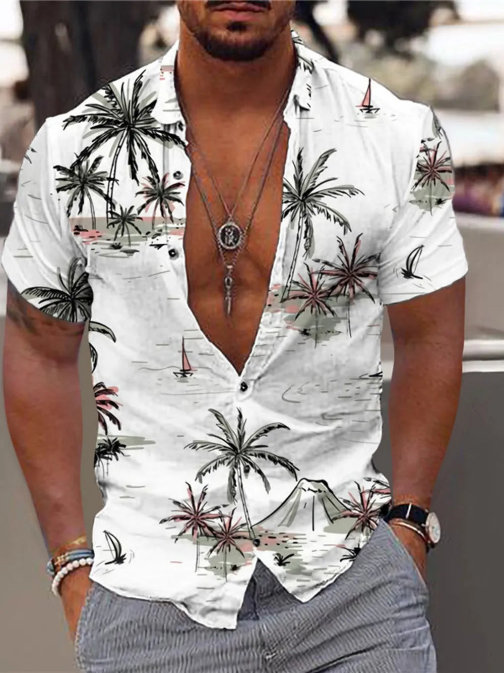 Men's white short sleeve button-down shirt with tropical palm trees and sailboats print
