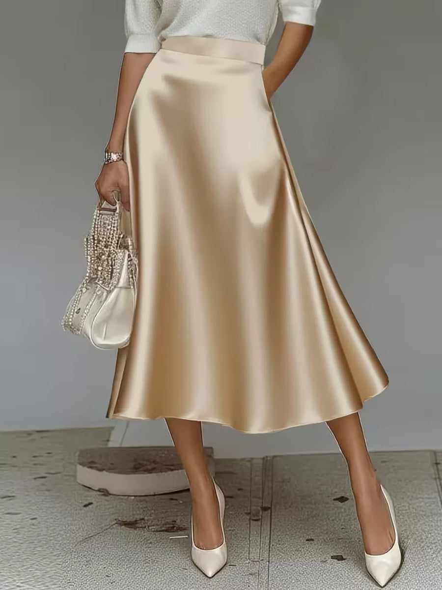 Elegant A-line satin skirt in Khaki Color with pockets, midi length.