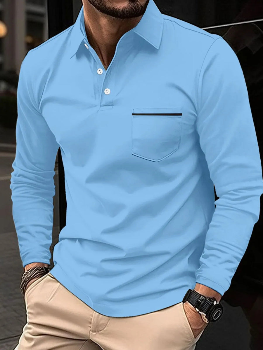 Light blue long-sleeve polo shirt with chest pocket and black trim detail.