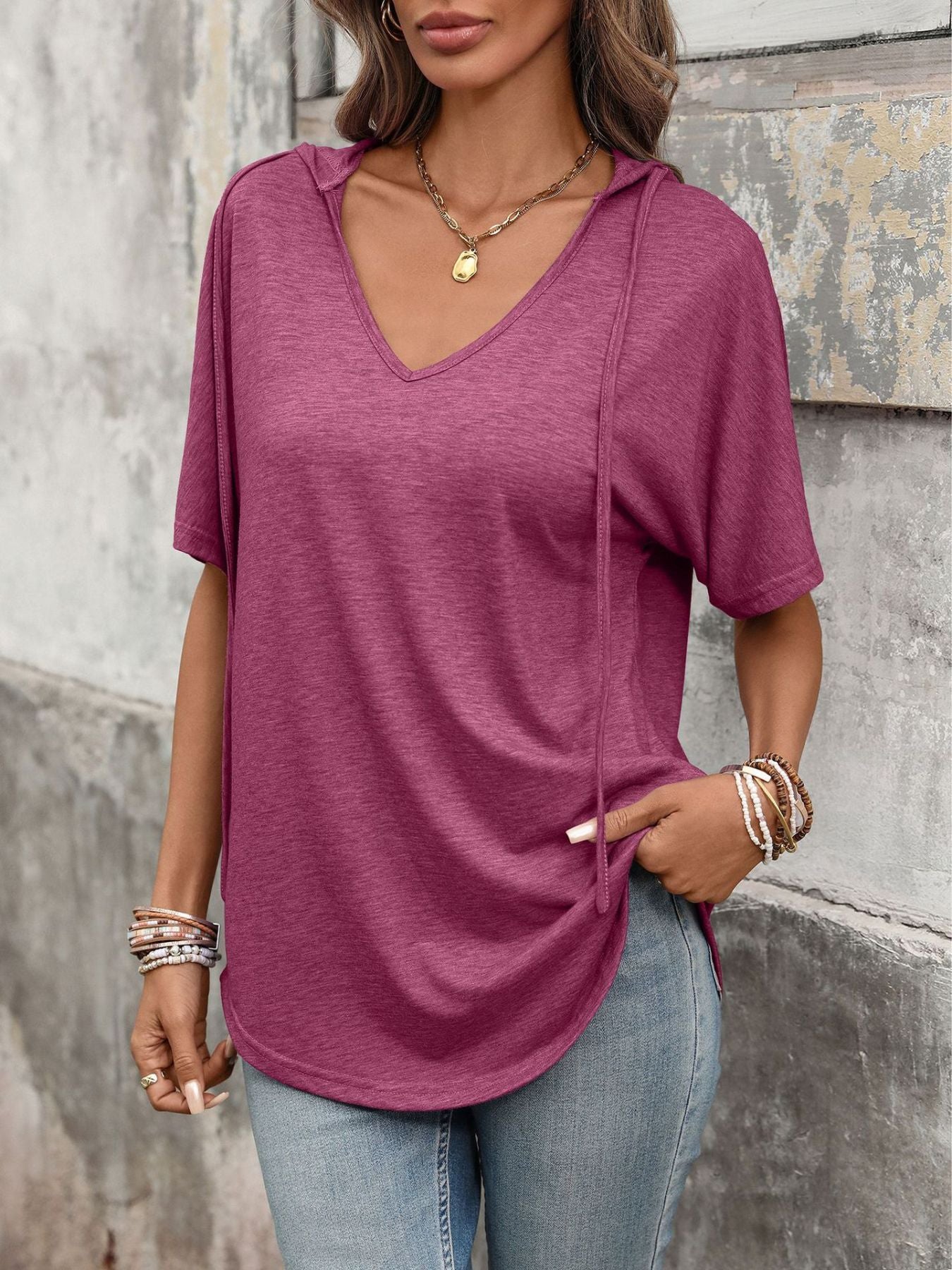 Burgundy short sleeve hooded t-shirt with V-neck and drawstring detail.