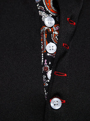 Black short sleeve shirt with paisley trim detail and white buttons