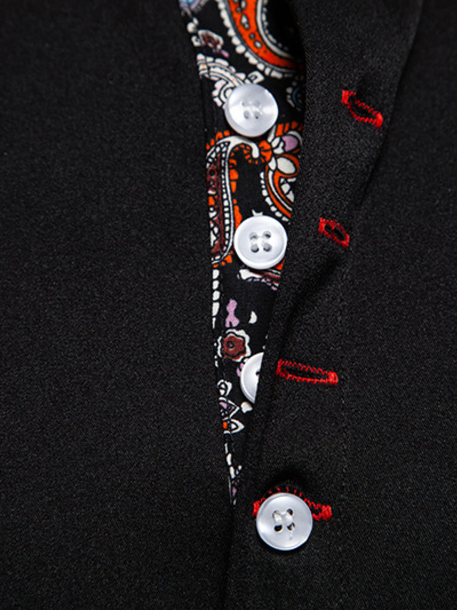 Black short sleeve shirt with paisley trim detail and white buttons