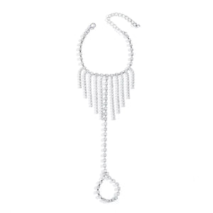 Rhinestone fringe hand chain bracelet in white K with adjustable clasp and chain detail.