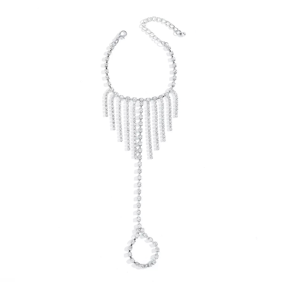 Rhinestone fringe hand chain bracelet in white K with adjustable clasp and chain detail.