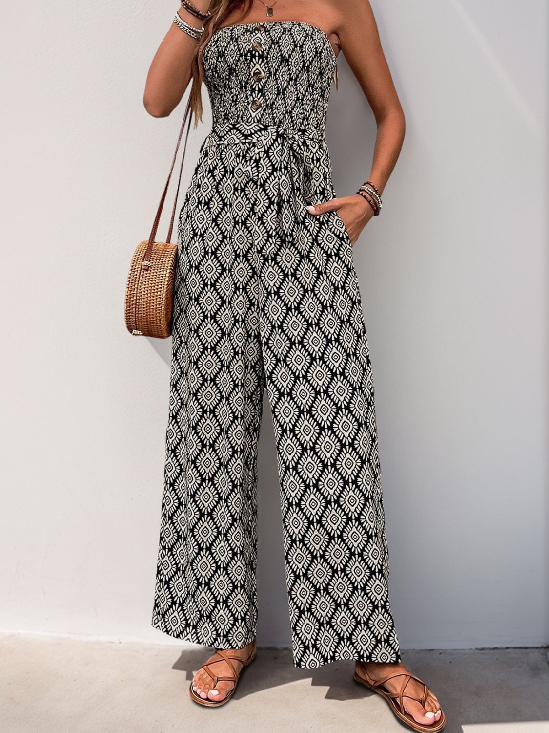 Black geometric print bandeau jumpsuit with belt and wide legs